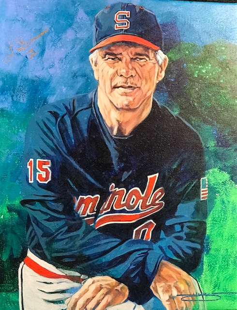 Pictured is a painting of former Trojan Head Baseball Coach Lloyd “Z” Simmons will be the guest speaker at the Trojan Baseball Banquet on Feb. 3. This portrait of Simmons was unveiled when he was inducted into College Baseball Hall of Fame in 2019.