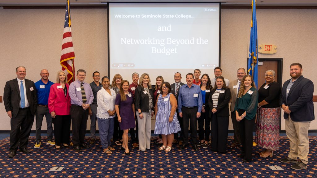 In this photo, 22 business office professionals from 14 public colleges, universities, and agencies across the State pose for a group photo.
