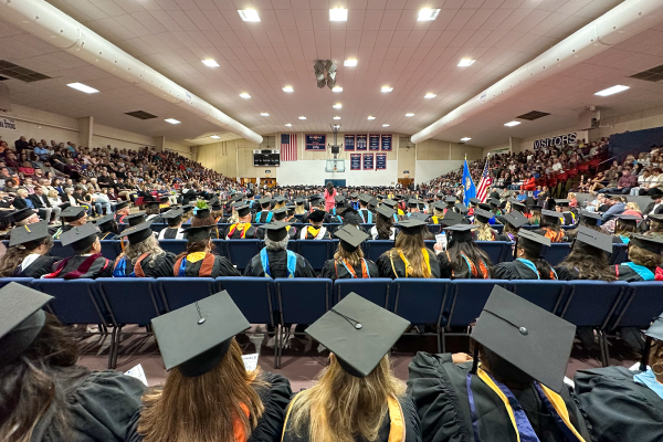 Pictured is a sea of students, faculty, and family members in attendance of the Seminole State College 2023 Commencement ceremony.