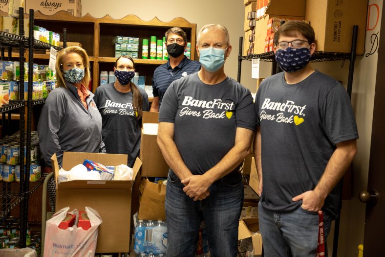 Volunteers stock food pantry