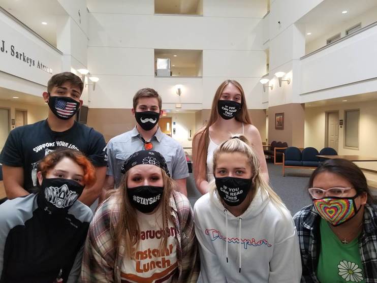 Resident Assistants wear silly masks.