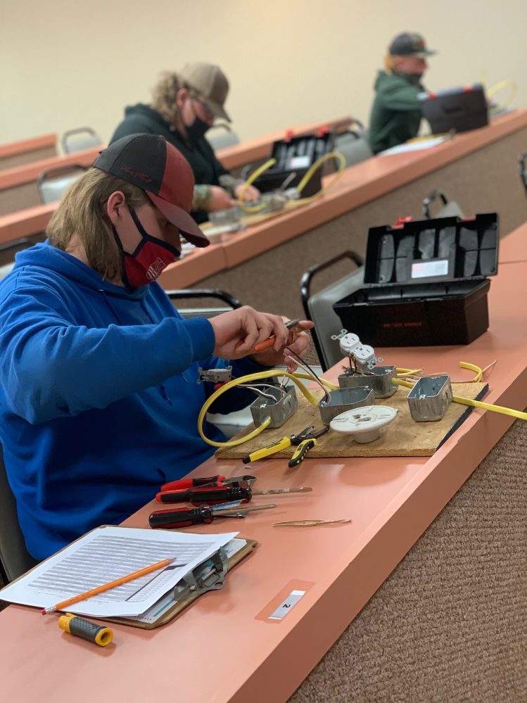 Strother student and FFA member Travis Woolsey works on a wiring project for the Electricity competition at the SSC FFA Interscholastic Contest on April 8. Wooley received a perfect score on his project.