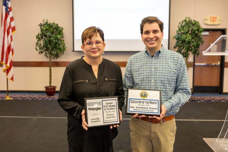 Pictured with their awards are Staff Member of the Month Sarah Ledford and Faculty Member of the Month Dr. Andrew Davis who were recognized at the Seminole Chamber of Commerce Forum Dec. 9.