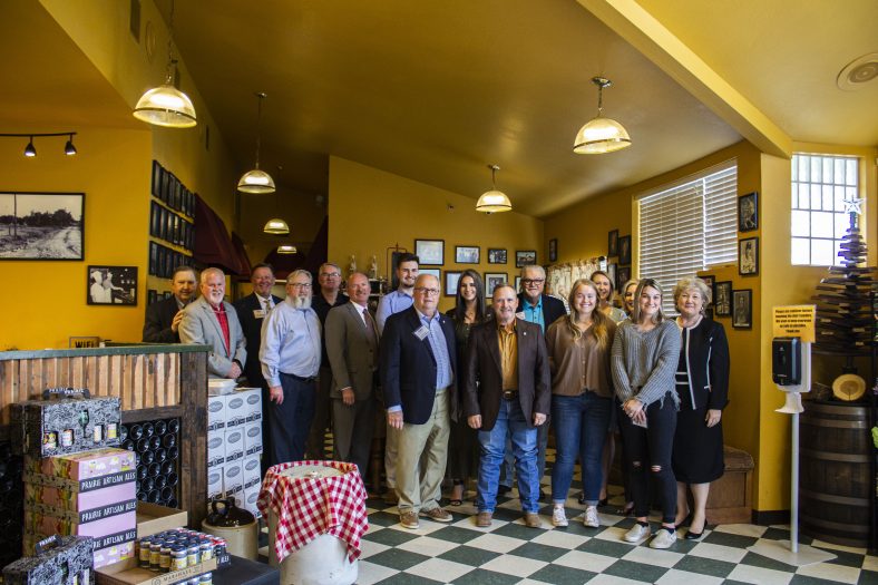 Group of students and legislators at restaurant