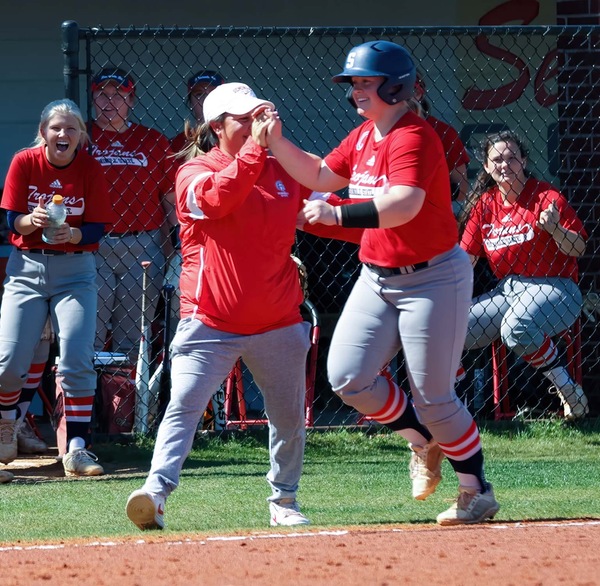 Softball runner scores