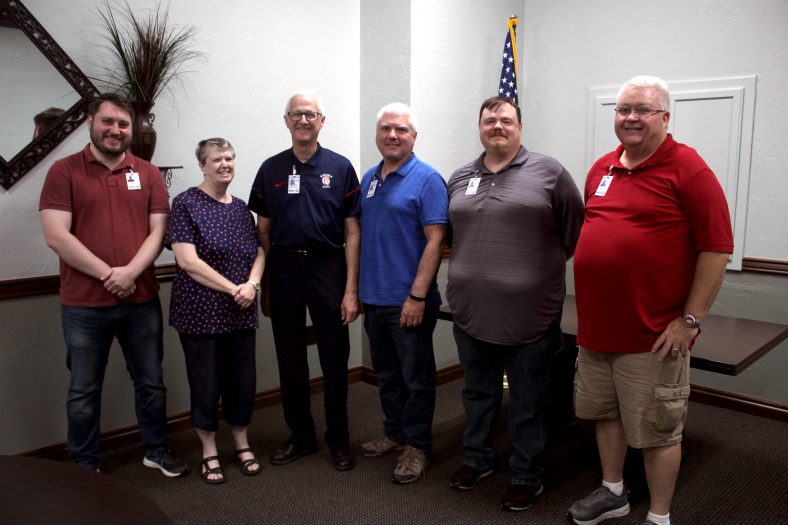 (pictured left to right): Eric Stark, Teresa Norman, Lindsey, Michael Murray, Marc Hunter and David Cobb.