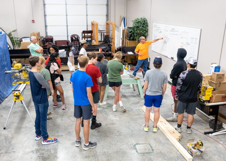 {File Photo} High school students learn about construction during the Peek into Engineering Summer Camp in July of 2022.