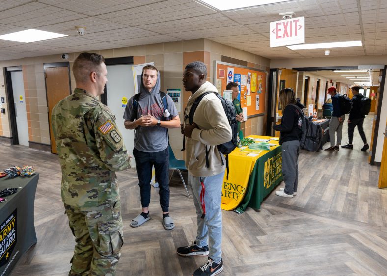 An Army National Guard recruiter speaks with SSC students during a career and transfer fair last fall. The College is now offering textbook waivers to Oklahoma National Guard members who qualify for the state’s Educational Assistance Program.