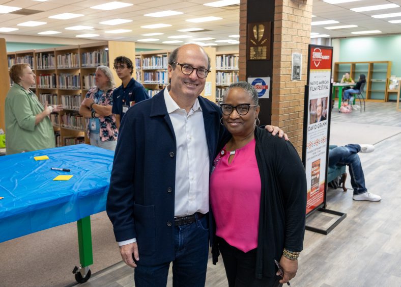 Pictured is NASNTI Director Kay Wallace (right) with “Killers of the Flower Moon” author David Grann (left) at a campus event on Sept. 21.