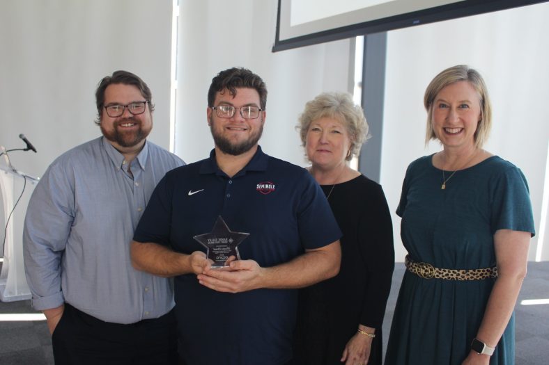Pictured (left to right): Communications Coordinator Josh Hutton, Nickell, President Lana Reynolds and Director of Community Relations Kim Pringle.