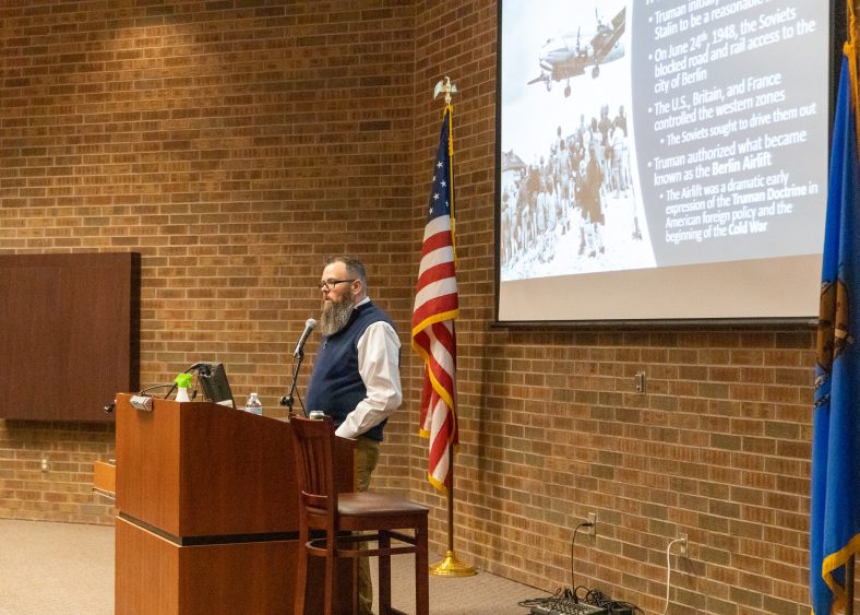 SSC Professor of Government Jeffrey Christiansen delivers a presentation at SSC.