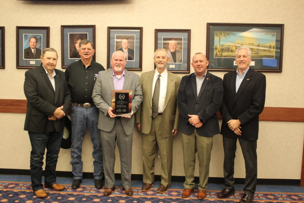 Trustees are pictured with the award (left to right) are: Jim Hardin, Roy Sisco, Lance Wortham, Chris Moore, Billy Norton and Mark Schell.