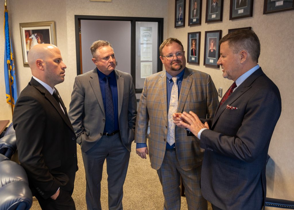 Pictured are Associate District Judge for Seminole County Brett Butner, Seminole City Attorney Brad Carter and Attorney Ryan Pitts as they visit with Oklahoma Attorney General Gentner Drummond following his presentation at Forum.