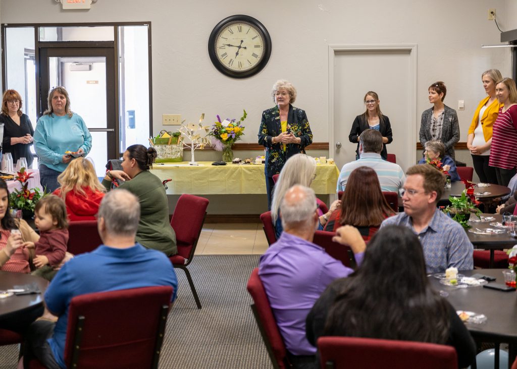 Pictured, SSC President Lana Reynolds addresses the crowd at a retirement reception held for Fiscal Affairs Administrative Assistant Carol Landes in the E.T. Dunlap Student Union on March 28.