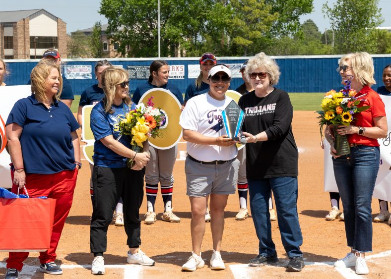 Pictured (left to right): SSC Athletic Director Leslie Sewell, OKC Spark Owner Tina Floyd, Flores, SSC President Lana Reynolds and Chair of the SSC Board of Regents Kim Hyden pose for a photo at Homeplate of the SSC Softball field.