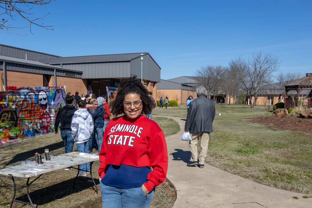 Pictured is SSC Assistant Professor of Art Lynette Atchley who assisted students as they made their own works of graffiti art.