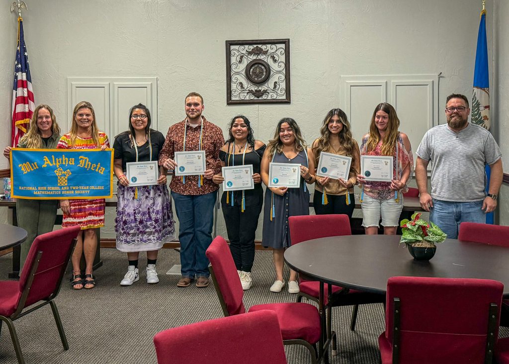 Pictured (left to right): STEM Division Chair Emily Carpenter, Assistant Professor of STEM and Mu Alpha Theta sponsor Melissa Bryant, inductees Nathania Mitchell of Seminole, Benjamin Foster of Prague, Caitlyn Factor of Wewoka, Gloria Barrett of Shawnee, Atriya Nourbakhsh of Shawnee, Ashley Pearson of Shawnee and induction keynote speaker Assistant Professor of Mathematics Cullen Birney. Not pictured but also inducted into the honor society was Ashlyn Turner of Lone Grove pose for a group photo.