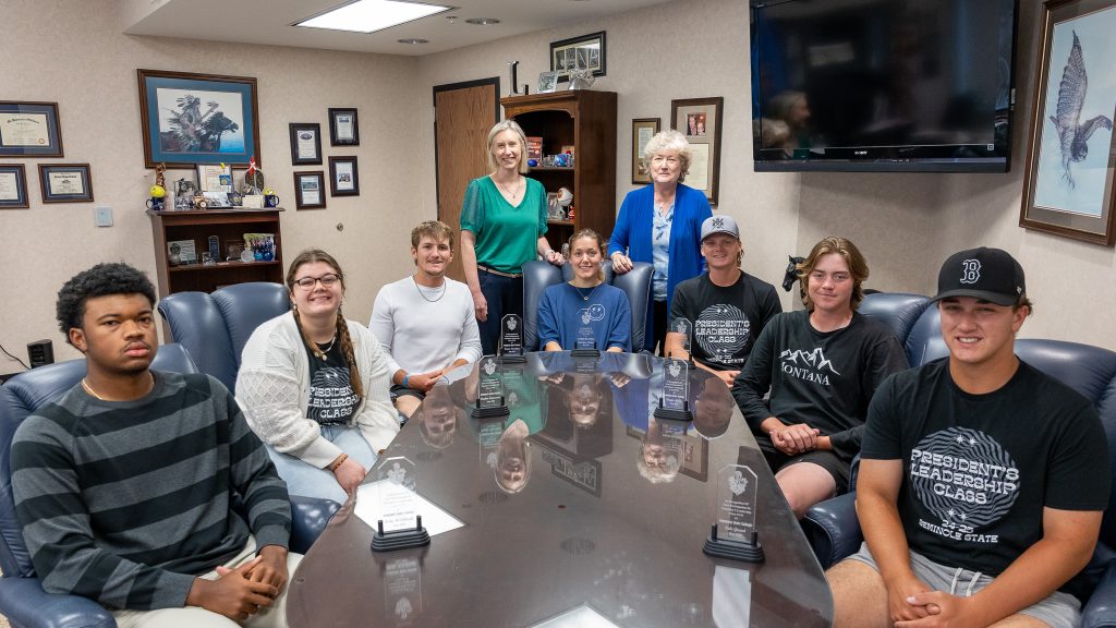In this photo, pictured, seated, left to right are: Ricky McCullough, Del City; Daphne Lamoureux, Seminole; Cooper Hamilton, Tahlequah; Amberlynn Mathews, Seminole; Logan Hill, Piedmont; Clayton Moore, Norman; and Cole Girard, Piedmont. Pictured, standing, are SSC President Lana Reynolds and Director of Community Relations and PLC sponsor Kim Pringle.