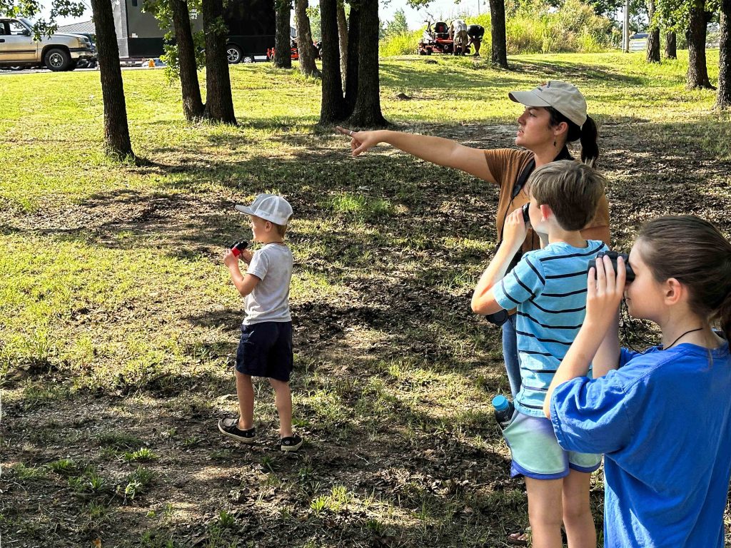 In this photo, an instructor helps point out wildlife during one the courses at a previous SSC Kids on Campus event.