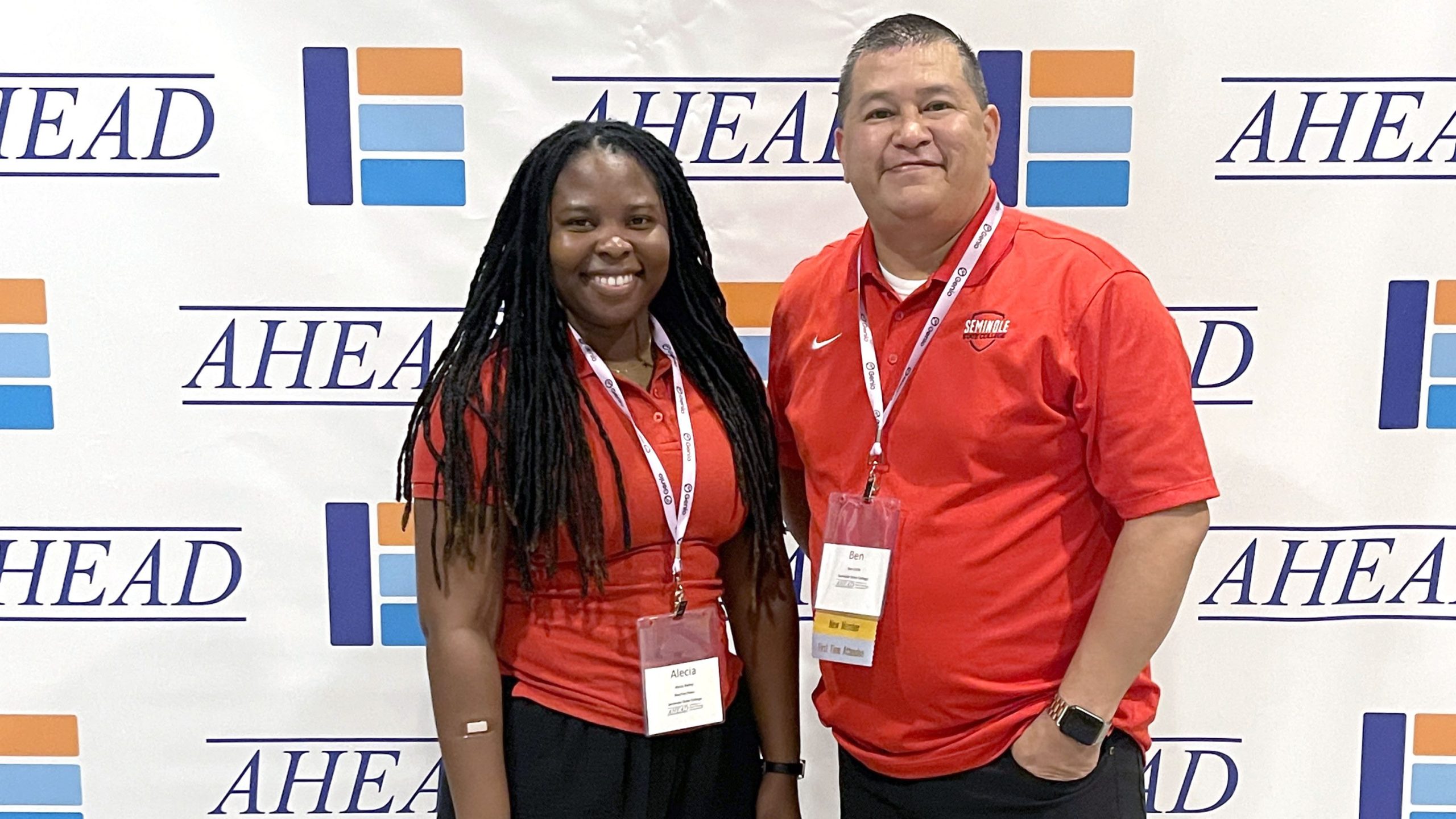 In this photo, Native American Serving Non-Tribal Institutions Computer Science Specialist Alecia Bailey (left) and NASNTI Student Success Specialist Ben Little pose for a photo after attending the AHEAD conference .