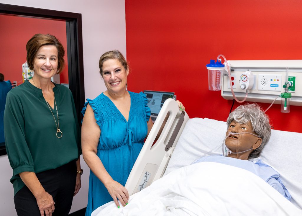 In this photo, SSM Health St. Anthony Hospital - Shawnee President Angi Mohr (left) and Seminole State College Nursing and Health Sciences Program Director Dr. Misty Gray (right) explore the new federally-funded simulation lab at the college.