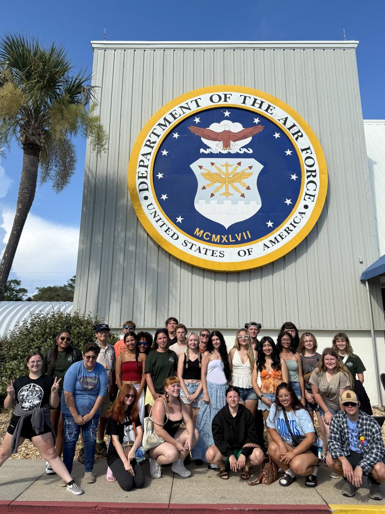 In this photo, Graduated seniors from SSC’s Upward Bound Bridge program stand outside the Air Force Armament Museum in Fort Walton Beach, Florida. The museum visit was one of several educational stops during their end-of-summer trip to prepare for college and future careers