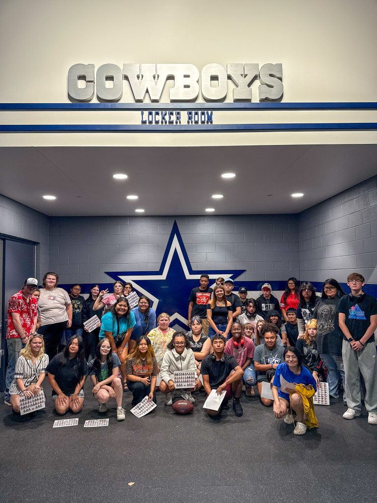 SSC Upward Bound students pose for a photo inside the Dallas Cowboys locker room at AT&T Stadium during their “Big Trip” to Dallas. The group toured the stadium as part of a week filled with college visits and cultural experiences.