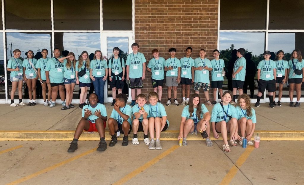 In this photo, participants in Seminole State College’s GEAR UP summer camp pose for a group photo outside the Enoch Kelly Haney Center. More than 160 students from 12 area schools attended the two-week event, which included campus tours, STEM lessons, recreational activities and college-readiness workshops.
