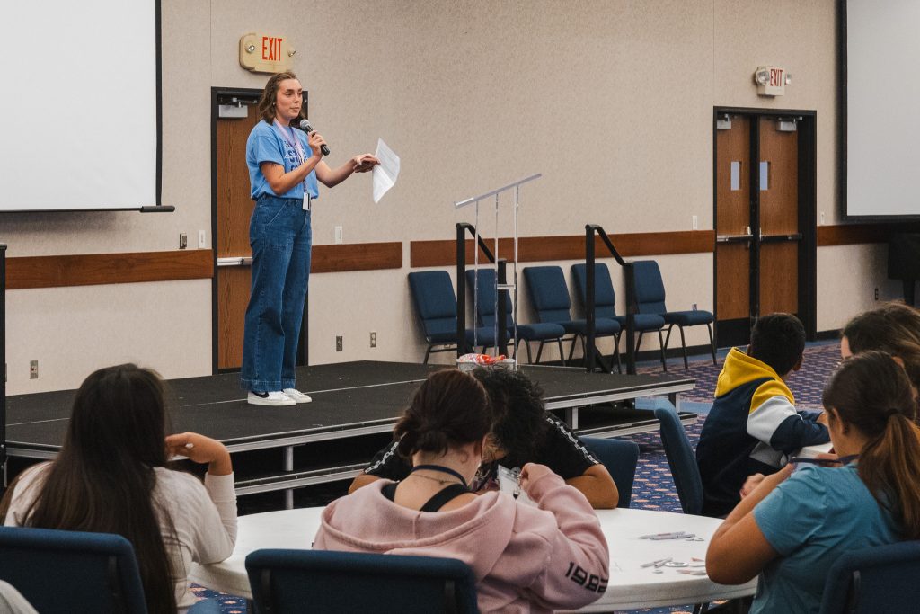Recruitment Specialist Maddy Potter speaks to junior high students.