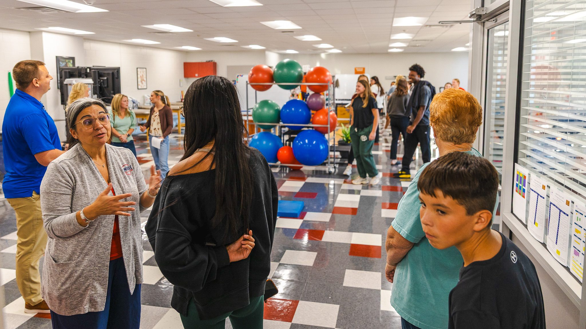 In this photo, Seminole State College Physical Therapist Assistant program Director Shakira Stafford talks with prospective students inside the PTA lab housed at Gordon Cooper Technology Center during the College’s in-person meet and greet on Oct. 20.
