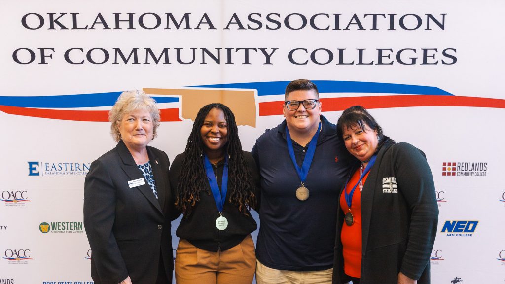SSC President Lana Reynolds congratulates OACC honorees—Professional Staff Member of the Year Alecia Bailey, Faculty Member of the Year Dr. Deanna Miles and Support Staff Member of the Year Alisha Riojas—for their achievements at the Oklahoma Association of Community Colleges’ annual conference on Oct. 3 at Oklahoma City Community College’s Visual and Performing Arts Center.