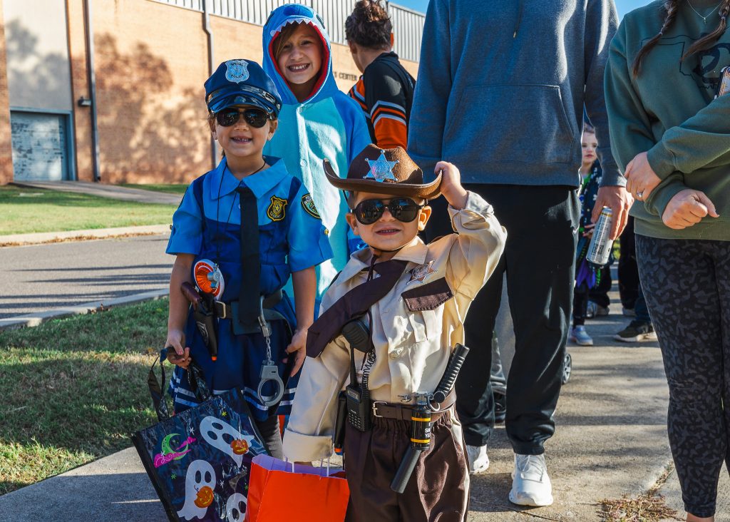 Two young attendees dressed as police officers, providing some extra backup for the SSC campus police at the event.