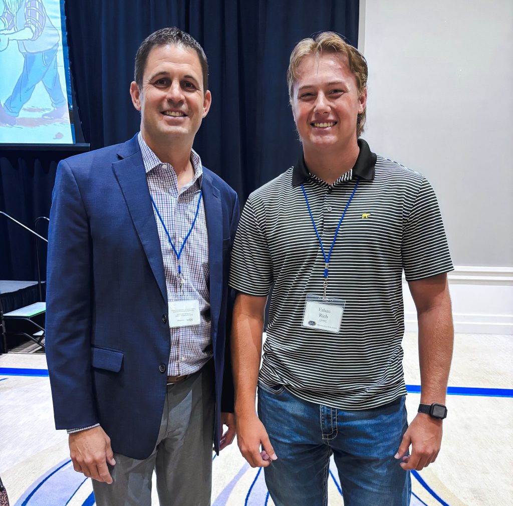 In this photo, SSC sophomore Ethan Rich (left) of Prague poses with former Trojan baseball player and SSC Alumni Hall of Famer Chris Schroeder, Director of the Association of County Commissioners of Oklahoma, during the Oklahoma Academy Town Hall.