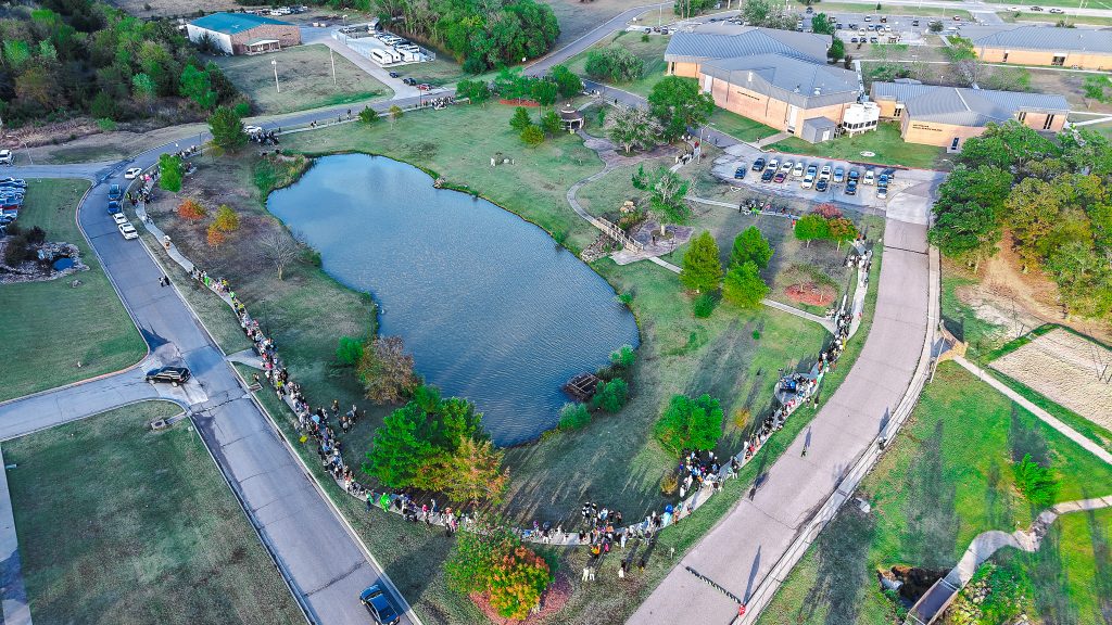 Aerial photo of people walking around the north pond.
