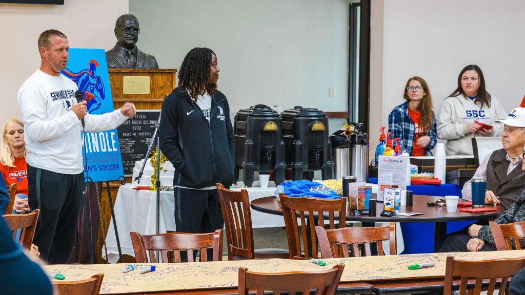 In this photo, Women’s Soccer Head Coach Dan Hill thanks the students, faculty, staff and community supporters in attendance at the event.