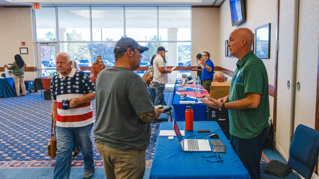 In this photo, Veterans are shown gathering information from different booths set up at the Seminole State College third annual Military and Veteran Resource Fair.