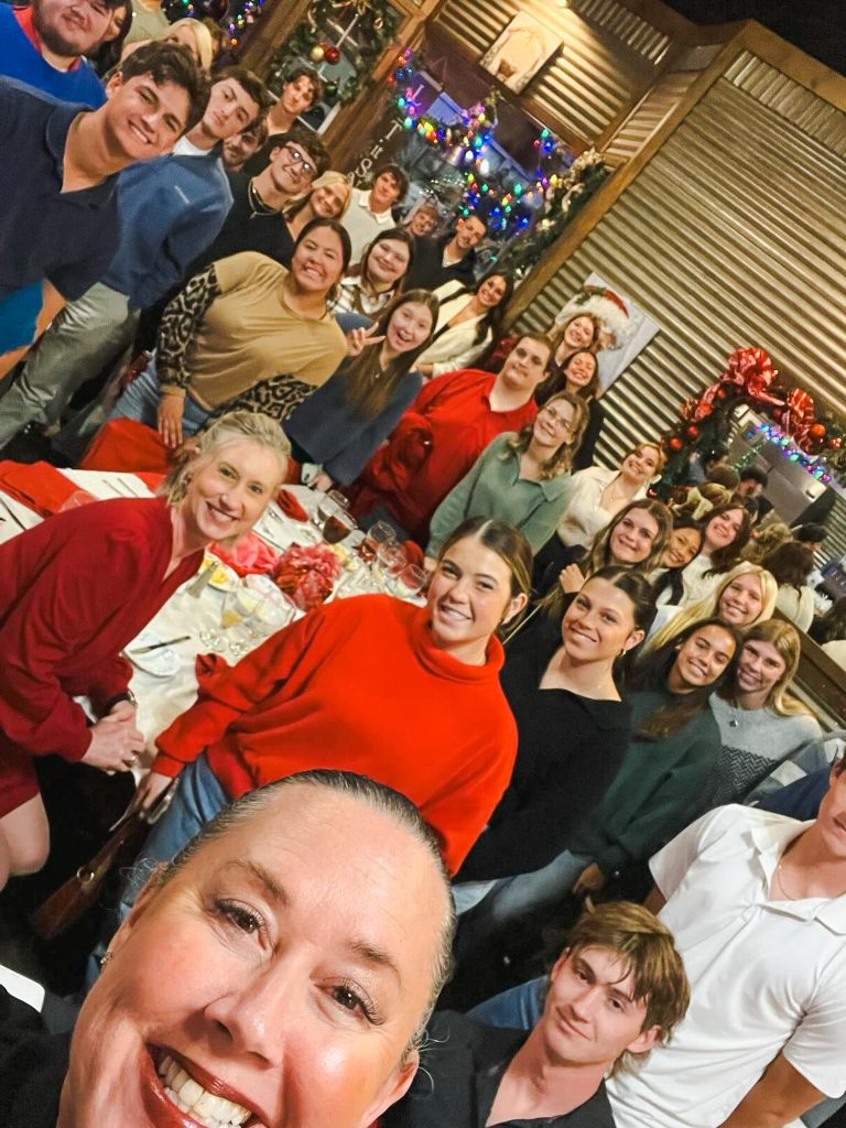 In this photo, Carey Sue Vega, owner of Etiquette Expert in Oklahoma City, takes a selfie with members of the Seminole State College President’s Leadership Class during a business and social etiquette session at Gigi’s Lunch Counter in Seminole on Dec. 4.
