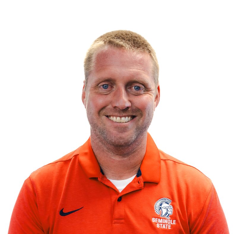 This photo shows a headshot of Dan Hill.