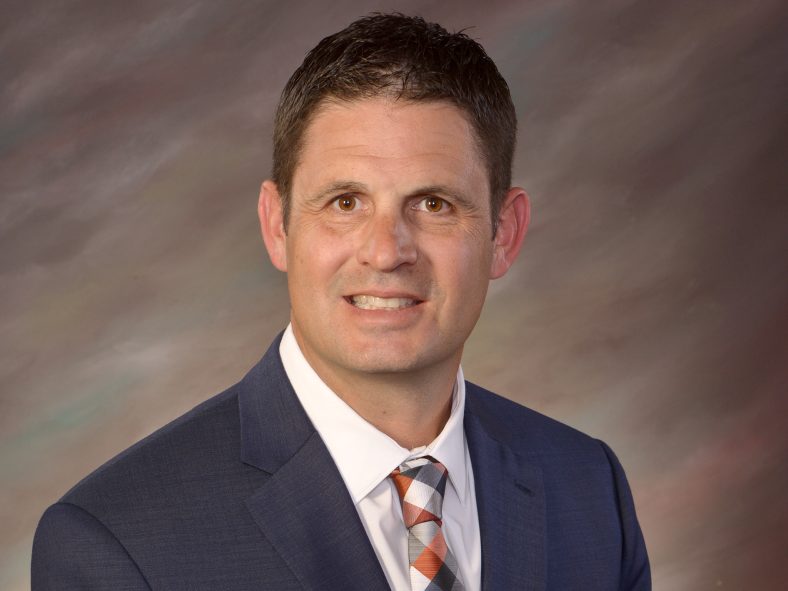 This photo is a portrait of Chris Schroder.