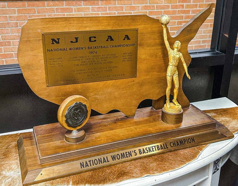 In this photo, the NJCAA Women’s Basketball 1976 National Championship trophy is displayed in Seminole State College’s Raymond Harber Field House.