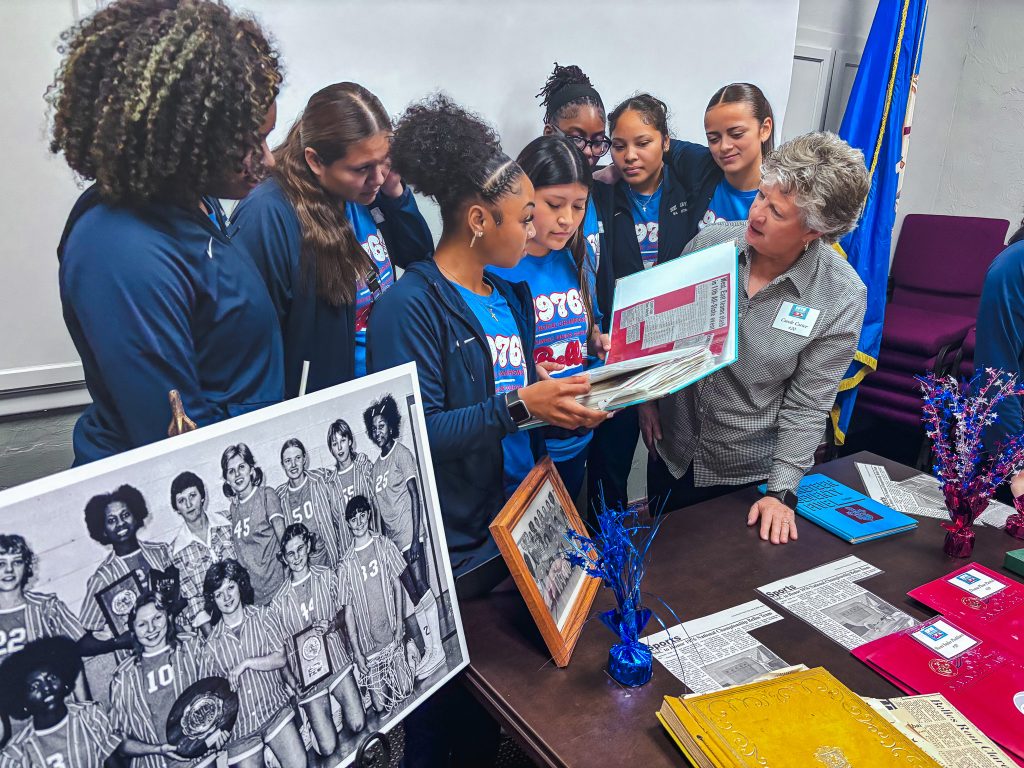 In this photo, National championship team member Carole Carter speaks with current SSC Belles players during a luncheon Feb. 16, sharing memories and lessons from the team’s championship season.