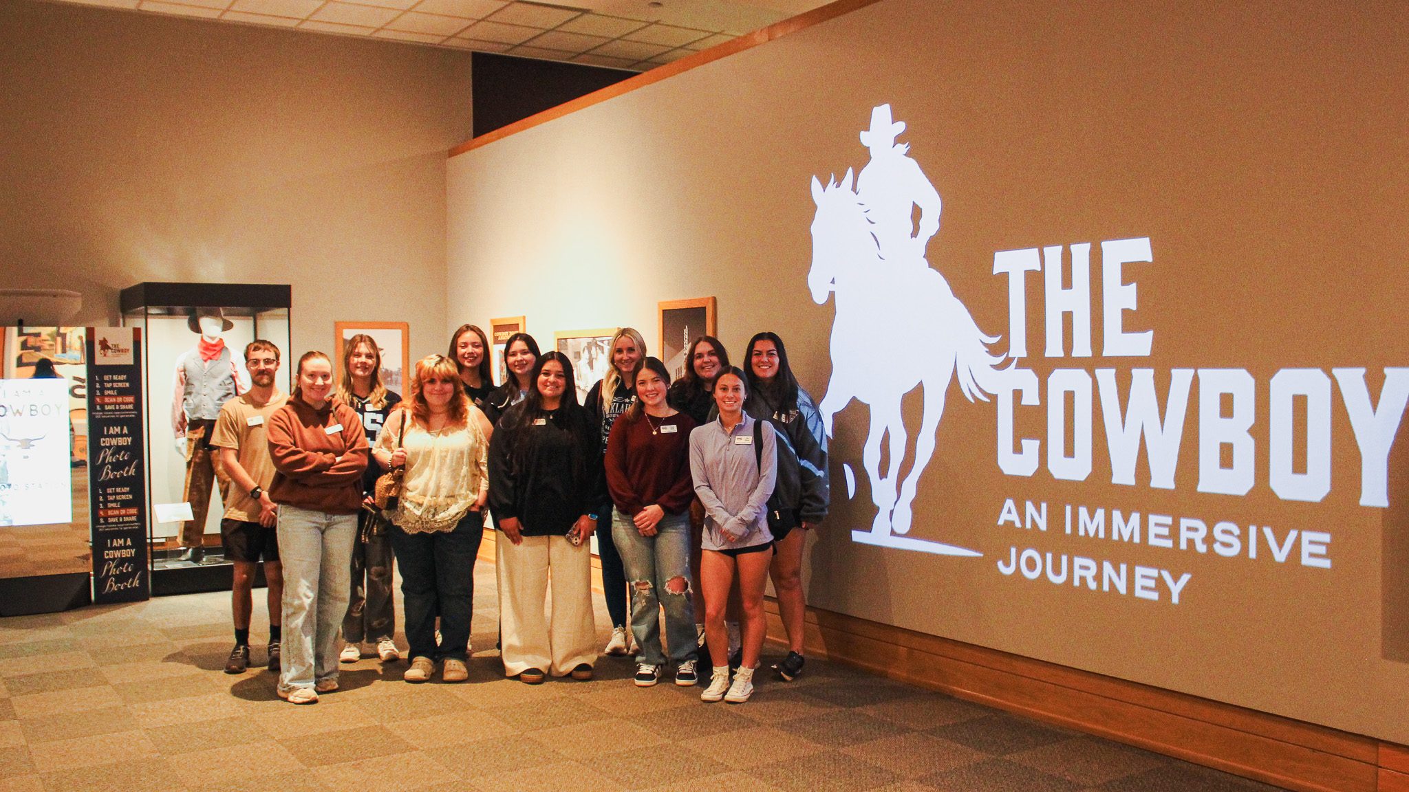 In this photo, Seminole State College President’s Leadership Class students pose for a group photo outside of “The Cowboy: An Immersive Journey” exhibit.