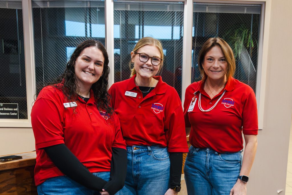 In this photo, SSC GEAR UP Educational Coordinators (from left) Leah Martin, Zoe Blue and Kate Sprague greet attendees at the Oklahoma’s Promise Family Event on March 7.