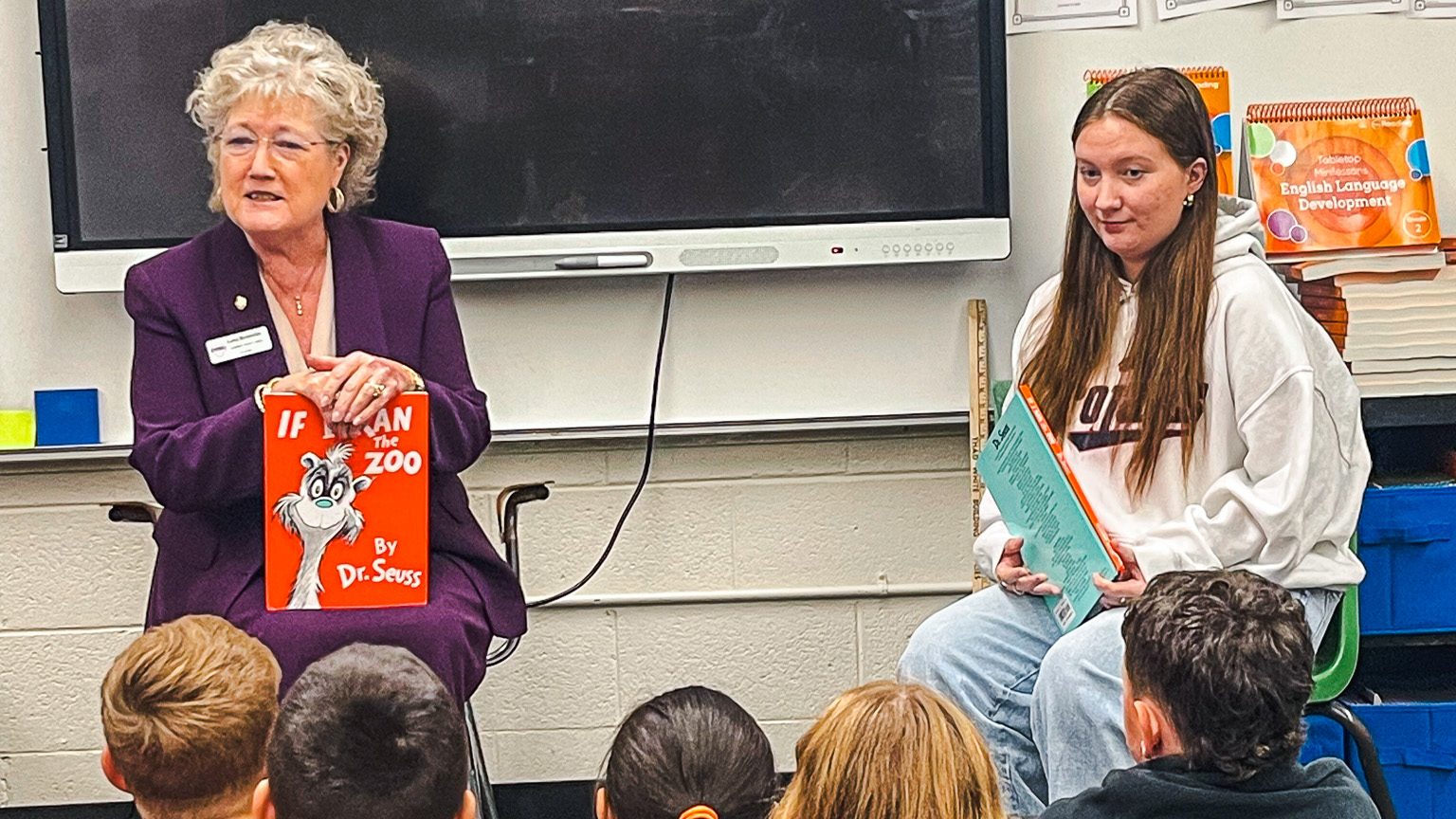 In this photo, President Lana Reynolds and SSC sophomore Hannah Upchurch of Seminole read If I Ran the Zoo by Dr. Seuss to students at Wilson Elementary School in Seminole during Read Across America Week.
