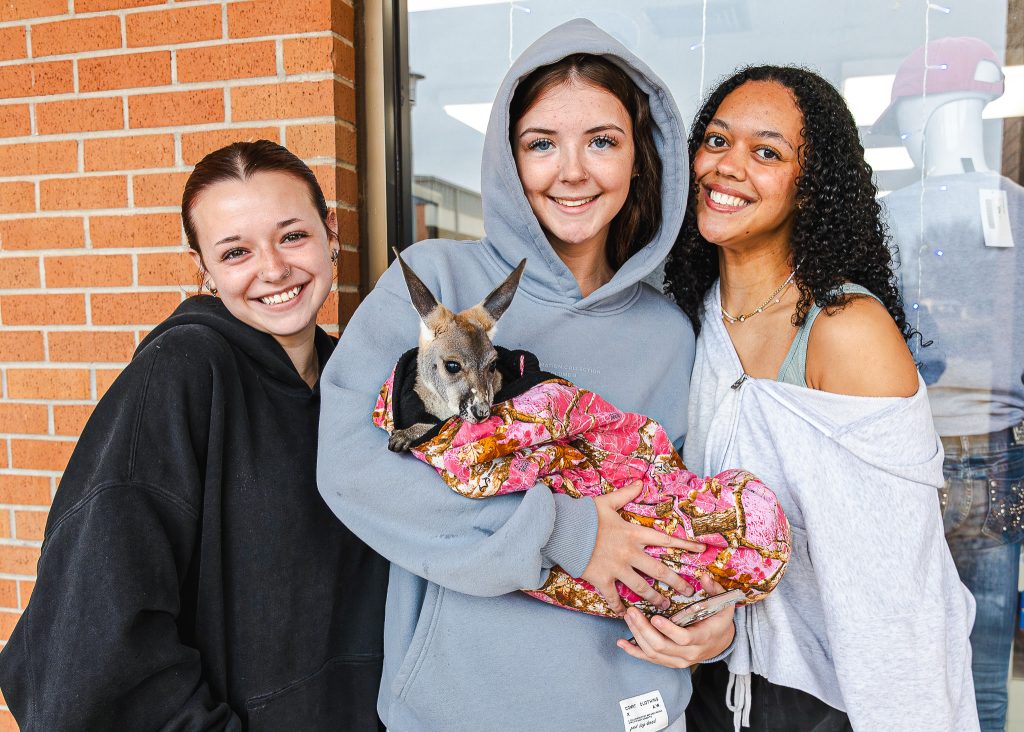 In this photo, SSC freshmen Becca Williams of Cache, Emma Noey of Seminole and Kennedy Johnson of Stillwater hold a wallaby during the Extreme Animals event on campus. Wallabies are members of the kangaroo family and are native to Australia.