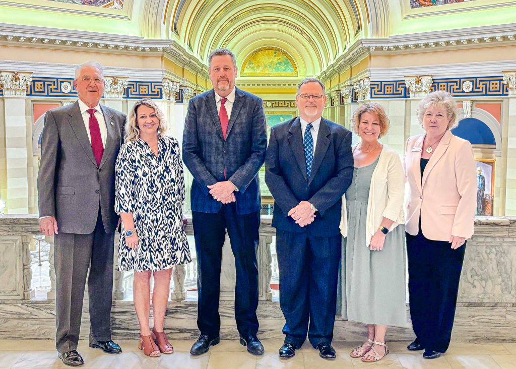 In this photo, pictured from left: Former State Senator Harry Coates, Haley Coates, State Senator Grant Green, David Hooten, Teri Hooten and SSC President Lana Reynolds pose for a group photo inside the Oklahoma State Capitol building.