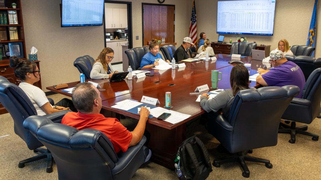 In this photo, Coaches from seven community colleges who will be competing in the NJCAA Region II Regional/District Tournament in Shawnee are shown during a meeting at Seminole State College.