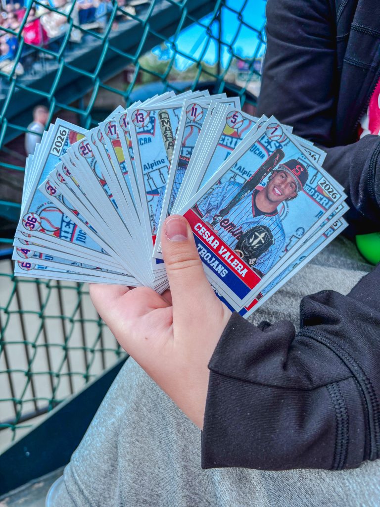 In this photo, Complete sets of baseball cards featuring the 2026 Trojan baseball team’s players and coaches that were sold as souvenirs in Grand Junction, Colorado are shown.