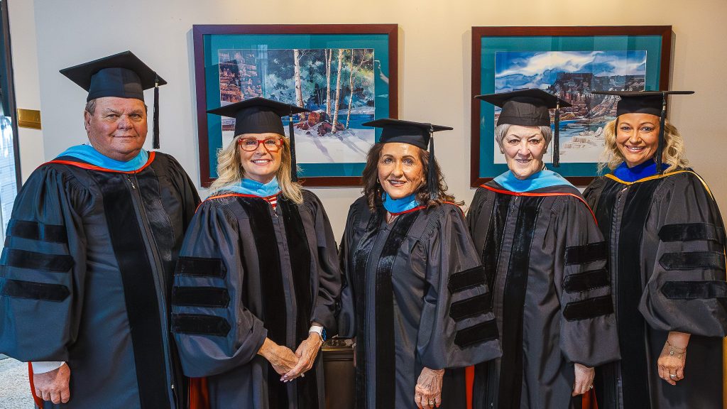 In this photo, Members of the SSC Board of Regents pose for a photo before the ceremony. Pictured, from left, are Curtis Morgan, Robyn Ready, Mona Adkisson, Marci Donaho and Haley Coates.