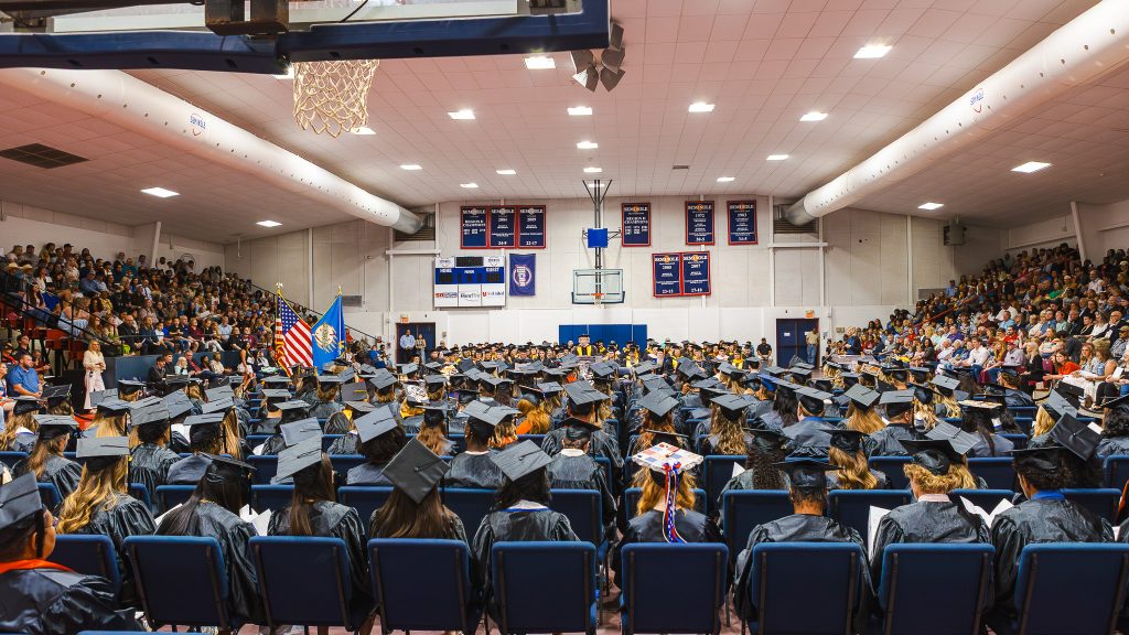 In this photo, Seminole State College graduates are seated inside the Raymond Harber Field House during the College’s 93rd Commencement Exercises on May 8.